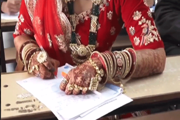 Bride-writing-exam