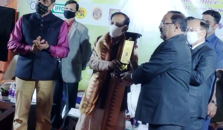 Dr. P.K.Mohanty receiving the award