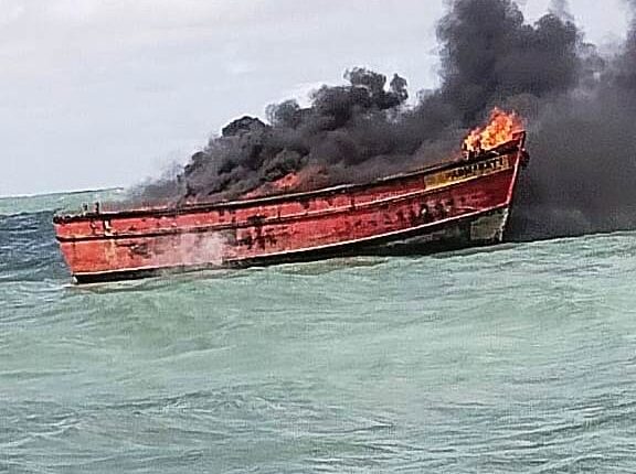 sea boat fire