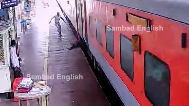 [Watch Video] Alert RPF jawan saves woman from coming under train in Ganjam